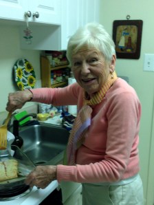 My mom, making me dinner as I watch and admire.