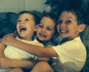 children laughing, brothers